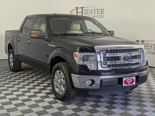 Used 2014 Ford F-150 XLT with VIN 1FTFW1CF0EKE52265 for sale in Lillington, NC